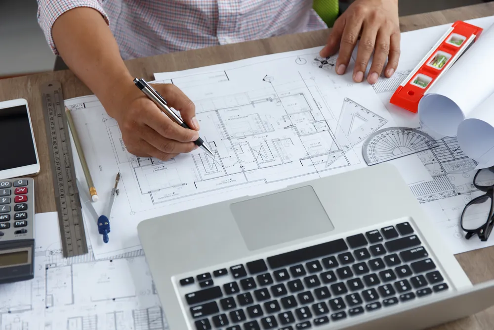 Dossier technique maison container avec plans d'architecte et notes de calcul pour convaincre un assureur